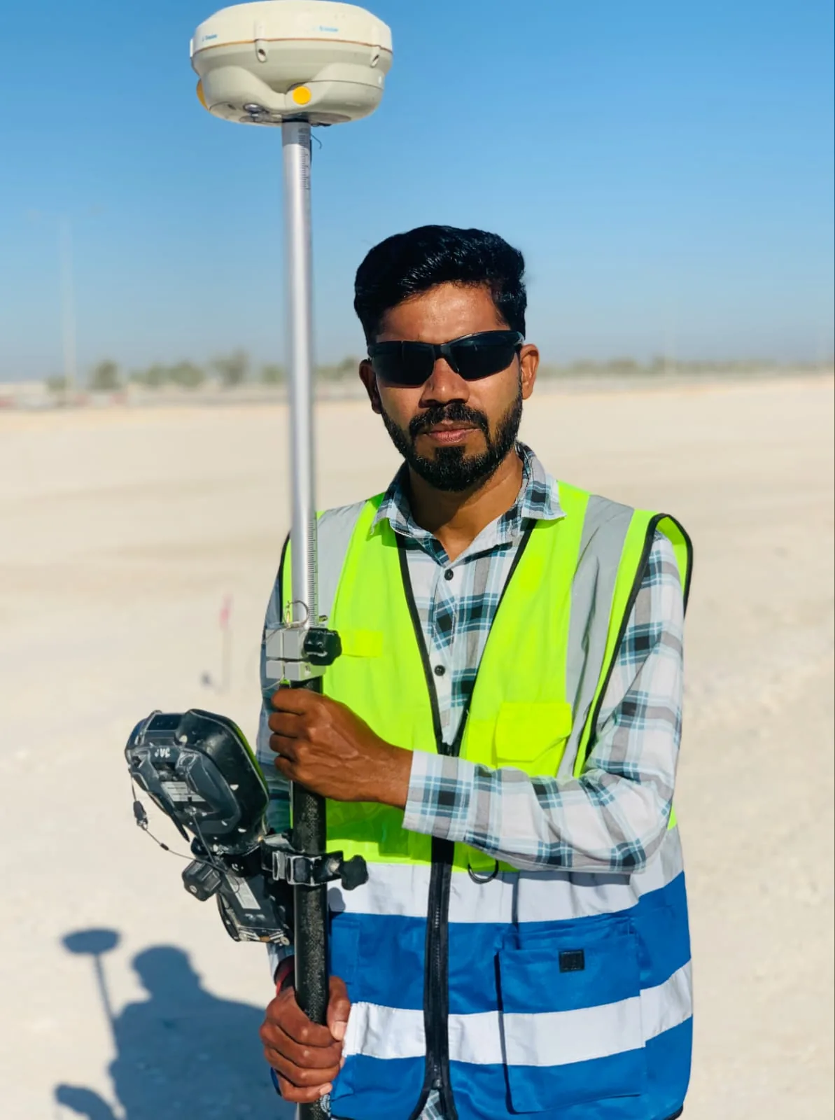 Surveyor with GNSS equipment